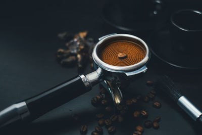 High angle view of coffee grinder on table