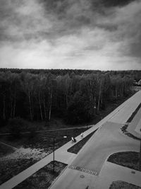 Road against cloudy sky