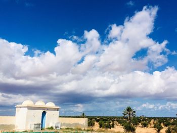 Building against cloudy sky