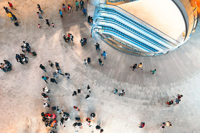 High angle view of people on street in city