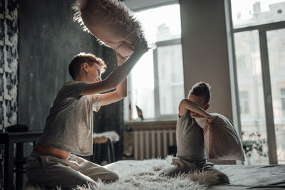 Young couple standing at home
