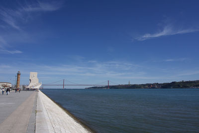 View of suspension bridge over sea