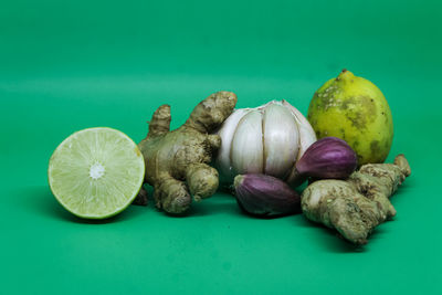 Close-up of fruits on blue background