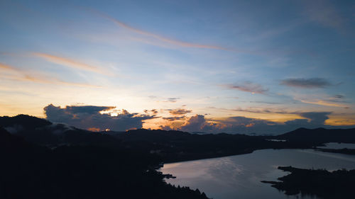 Aerial view of kenyir lake during blue hour sunrise.