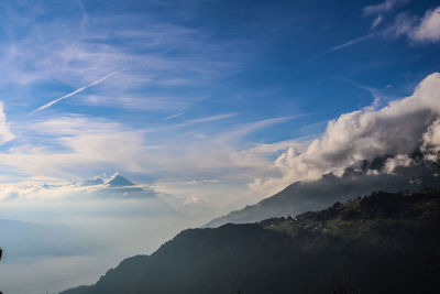 Low angle view of mountain range against sky