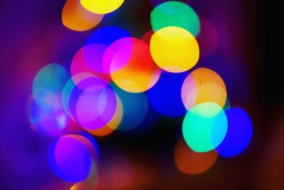 Defocused image of illuminated colorful lights