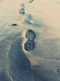 High angle view of sand at beach