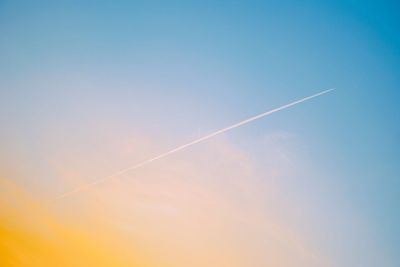 Low angle view of vapor trail in sky