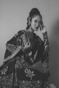 A women model with traditional indonesian's fashion called batik