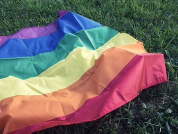 High angle view of multi colored umbrella on field