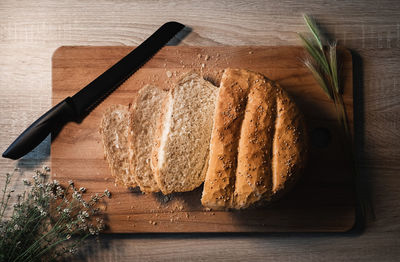 High angle view of bread on cutting board