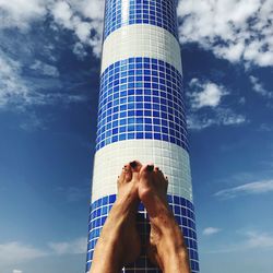 Low angle view of woman against sky