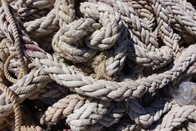 Full frame shot of rope tied on wood