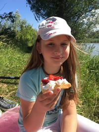 Portrait of smiling girl holding ice cream