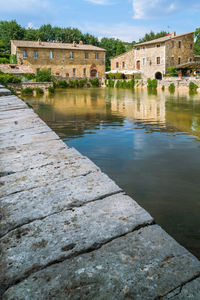 View of old building by lake