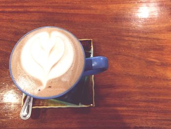 High angle view of cappuccino on table