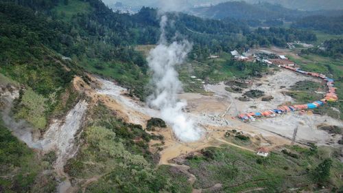 High angle view of people on mountain road