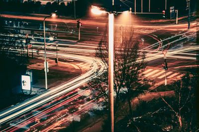 High angle view of light trails on road at night