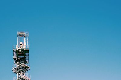 Low angle view of built structure against blue sky