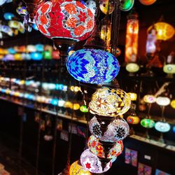 Illuminated lanterns hanging at night