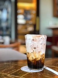 Close-up of coffee served on table