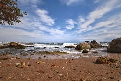 Scenic view of beach against sky