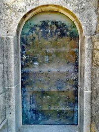 Abandoned building seen through closed door
