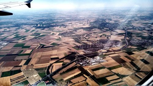 Aerial view of cityscape against sky