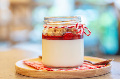 Close-up of ice cream in glass on table