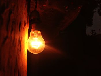 Close-up of illuminated light bulb