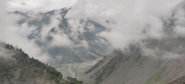 Panoramic view of mountains against sky