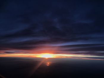 Scenic view of dramatic sky during sunset