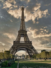 View of tower against cloudy sky