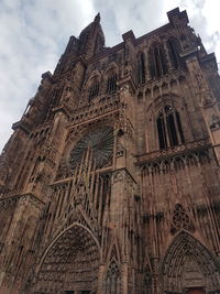 Low angle view of temple building against sky