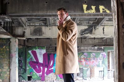 Mid adult man standing outdoors