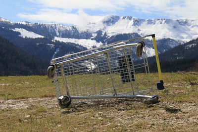 Shopping cart on field