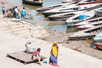 High angle view of people working in boat