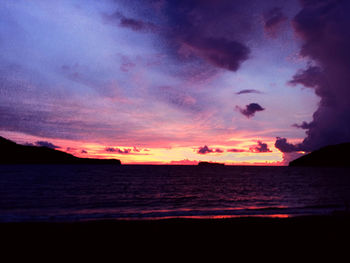Scenic view of sea against sky at sunset