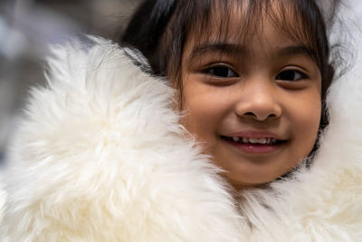 Close-up portrait of happy girl