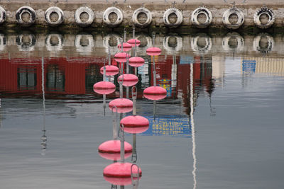 View of buoy floating in sea at pier