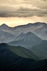 Scenic view of mountains against sky during sunset
