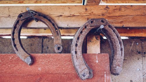 Close-up of rusty abandoned horseshoes
