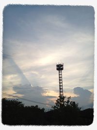 Low angle view of cloudy sky at sunset