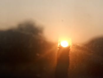 Sun shining through clouds