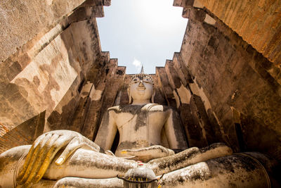 Low angle view of statue against the sky