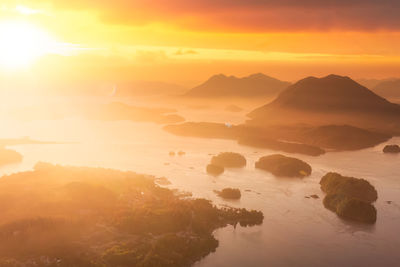 Scenic view of mountains against sky during sunset