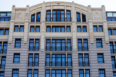 Low angle view of modern building against clear sky