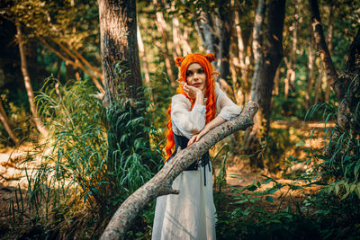 Young woman  in forest