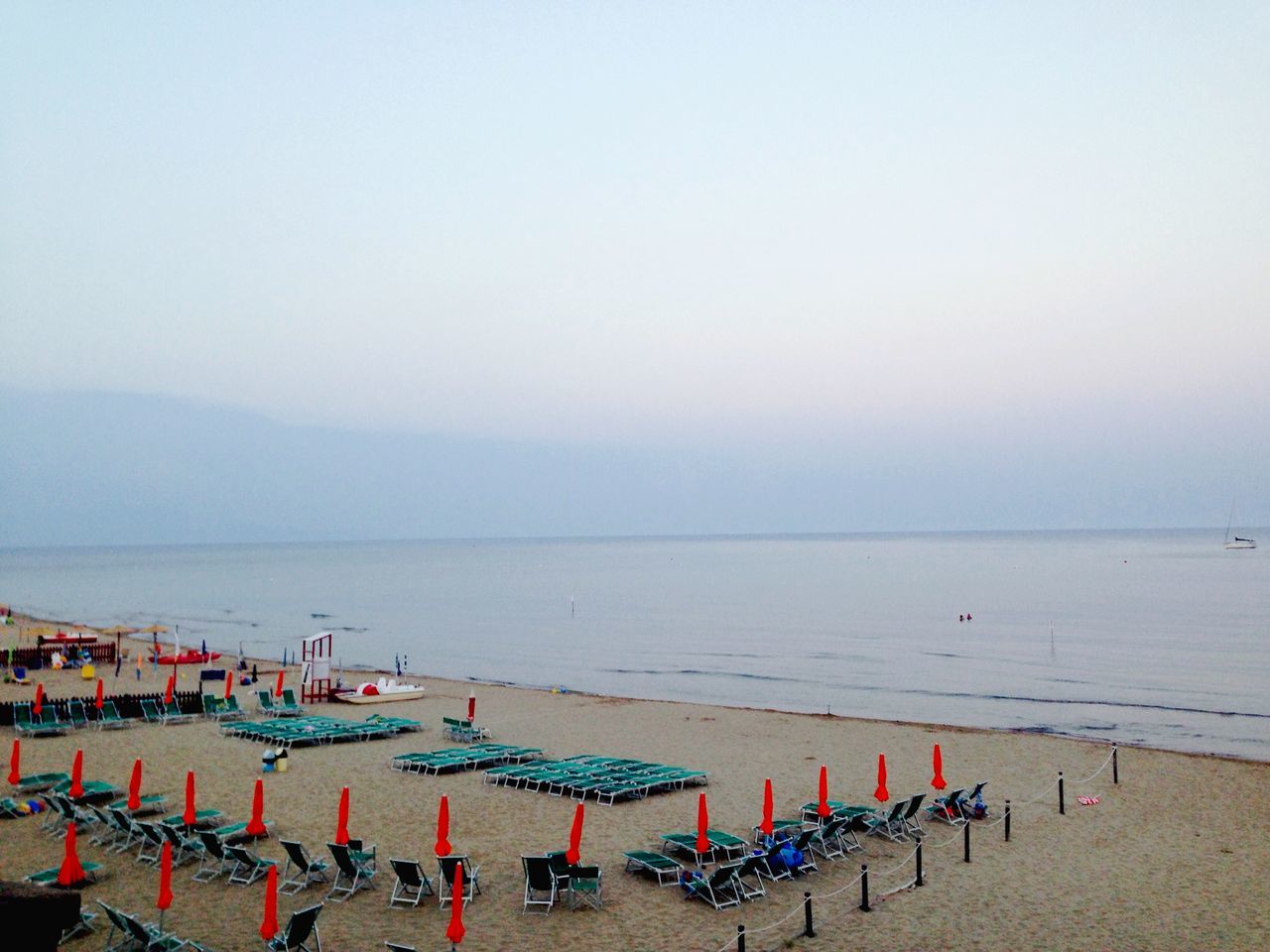 sea, water, horizon over water, beach, tranquil scene, tranquility, scenics, copy space, clear sky, beauty in nature, nature, shore, sky, pier, idyllic, chair, vacations, sand, outdoors, ocean