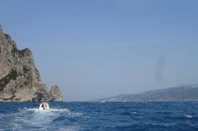 Sailboat sailing in sea